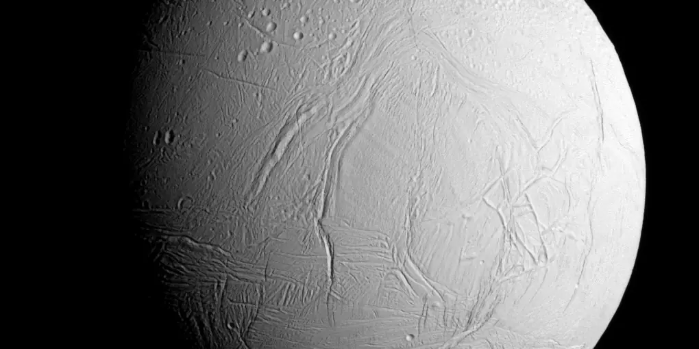 Photograph of Enceladus, a moon of Saturn.