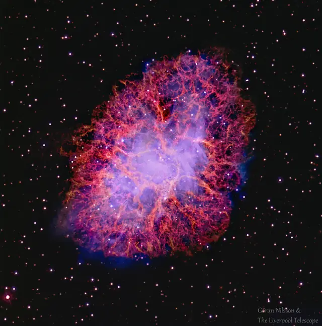 Photograph of Crab Nebula, a supernova remnant in Taurus.