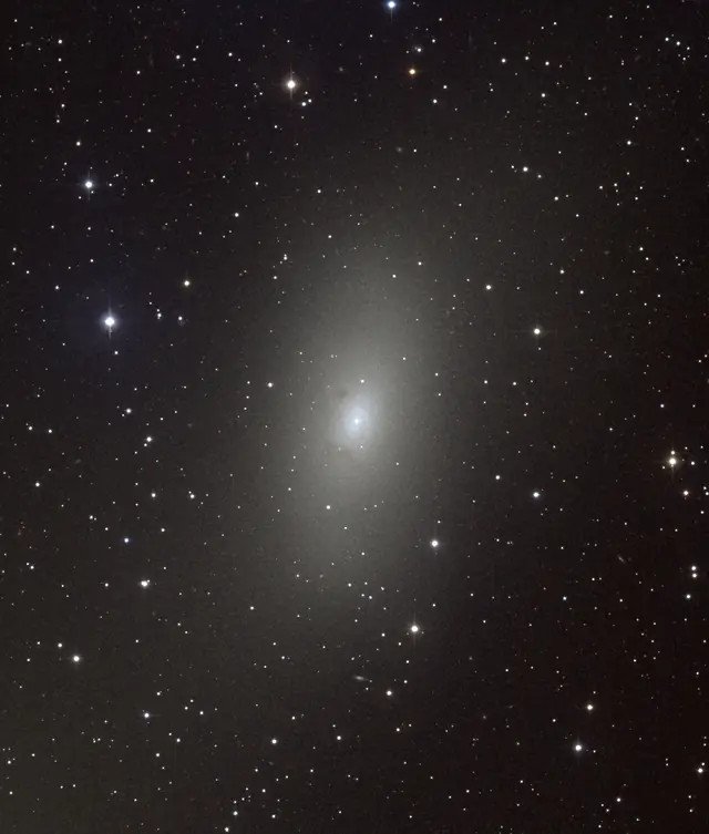 Photograph of M110, an elliptical galaxy E in Andromeda.