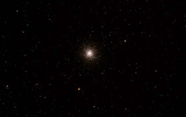 Photograph of Hercules Globular Cluster, a globular cluster in Hercules.