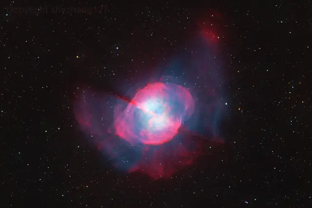 Photograph of Dumbbell Nebula, a planetary nebula in Vulpecula.