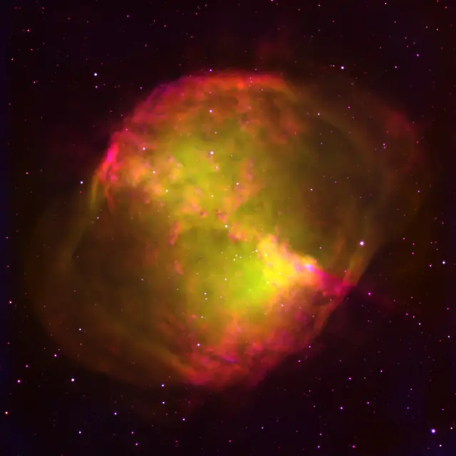 Photograph of Dumbbell Nebula, a planetary nebula in Vulpecula.