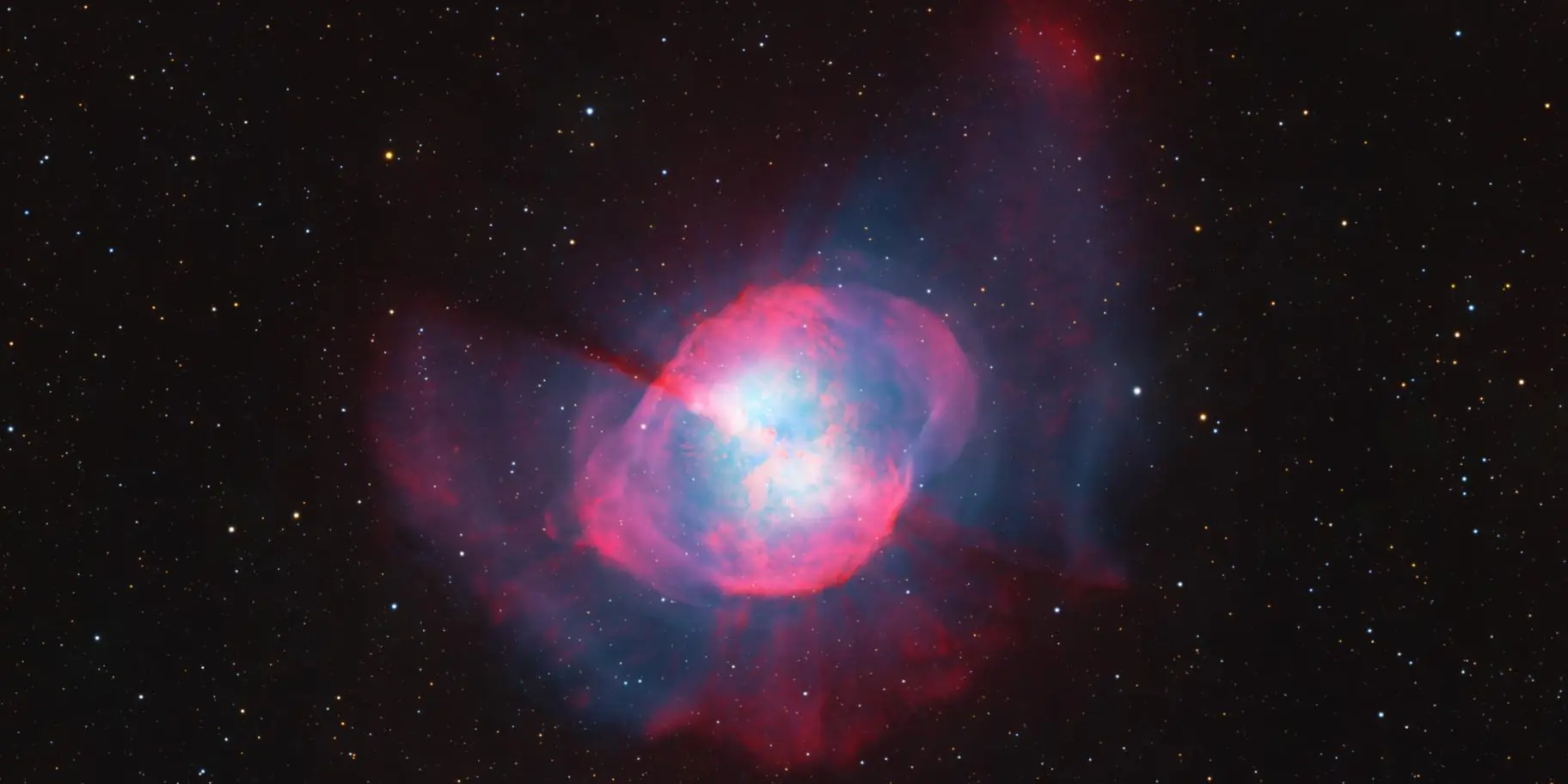 Photograph of Dumbbell Nebula, a planetary nebula in Vulpecula.