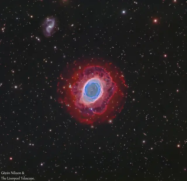 Photograph of Ring Nebula, a planetary nebula in Lyra.