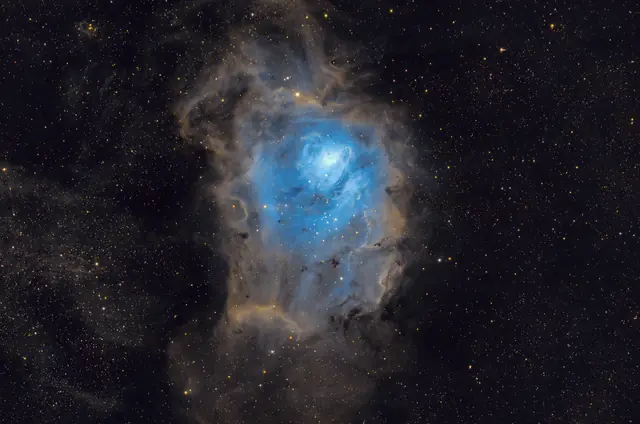 Photograph of Lagoon Nebula, a nebula in Sagittarius.