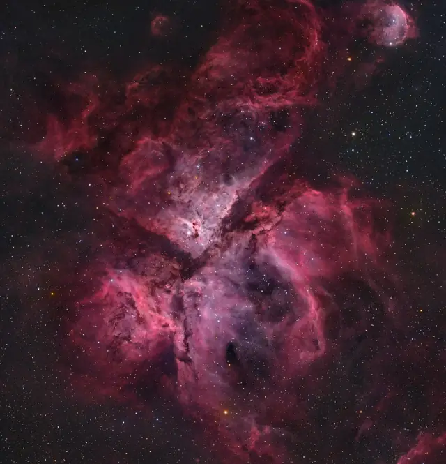 Photograph of Carina Nebula, an H II region in Carina.