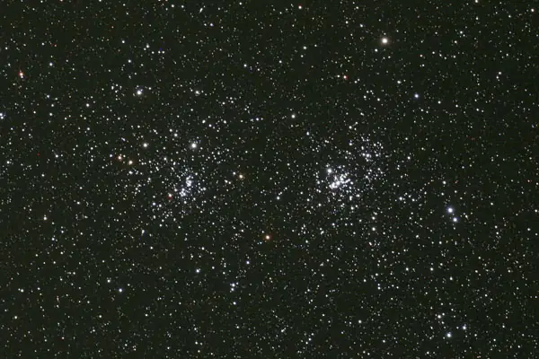Photograph of h Persei Cluster, an open cluster in Perseus.