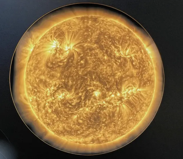 Photograph of the Sun, a G2V yellow main-sequence star.