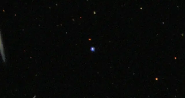 Photograph of TON 618, a supermassive black hole in Canes Venatici.