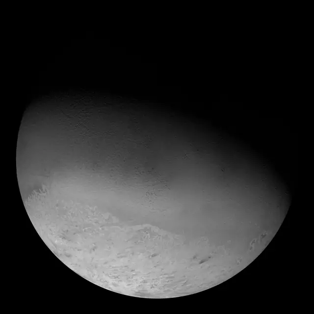 Photograph of Triton, a moon of Neptune.