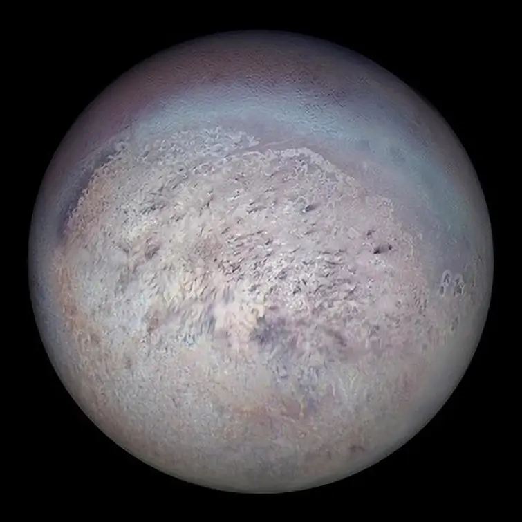 Photograph of Triton, a moon of Neptune.