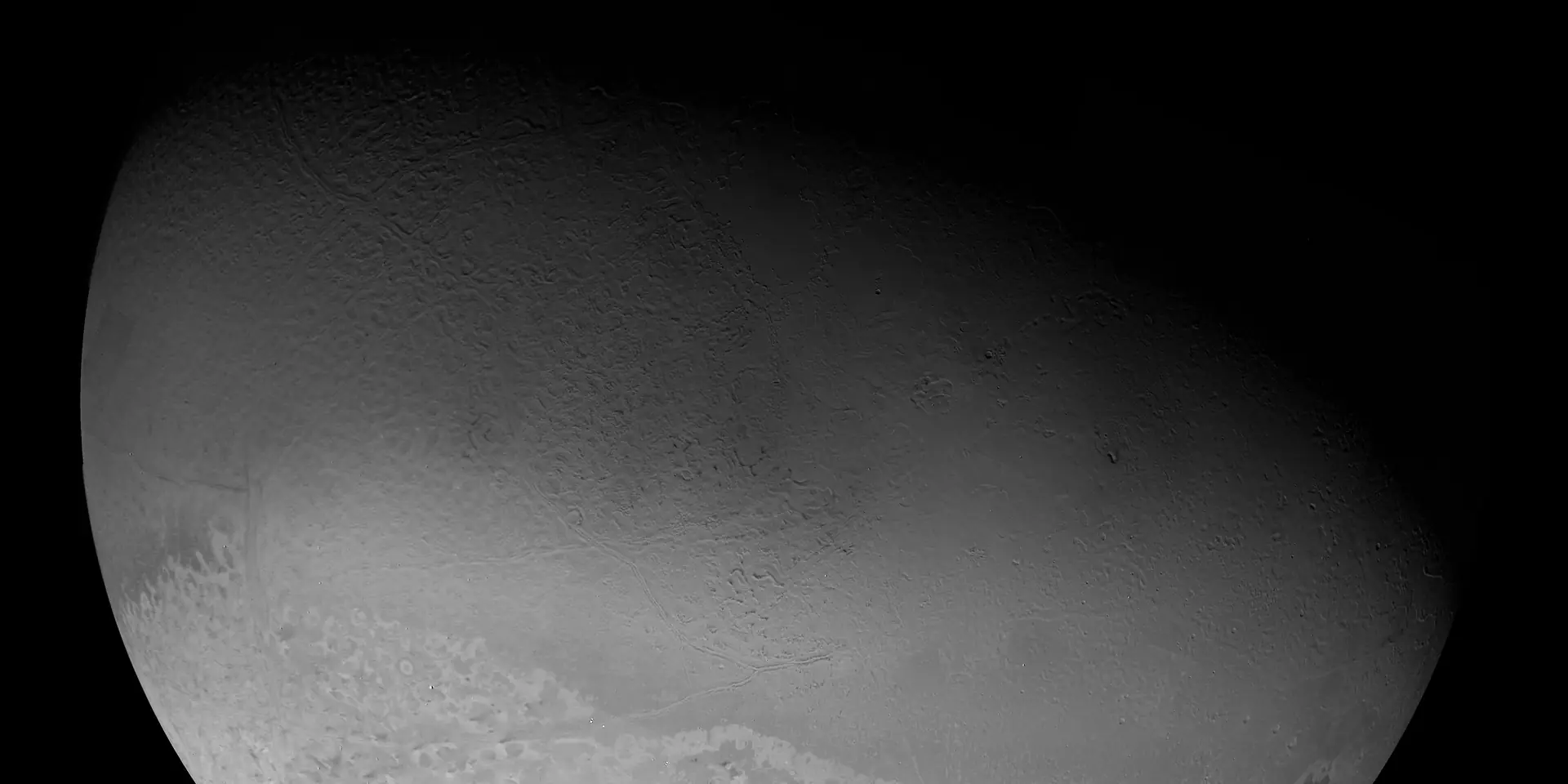 Photograph of Triton, a moon of Neptune.
